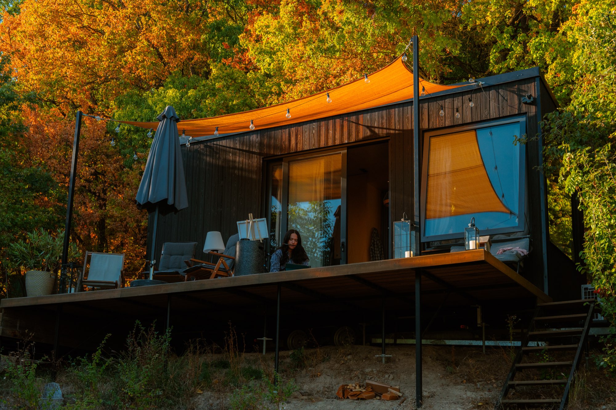 Tiny Heart Cabin at golden hour on the hillside above Kismaros